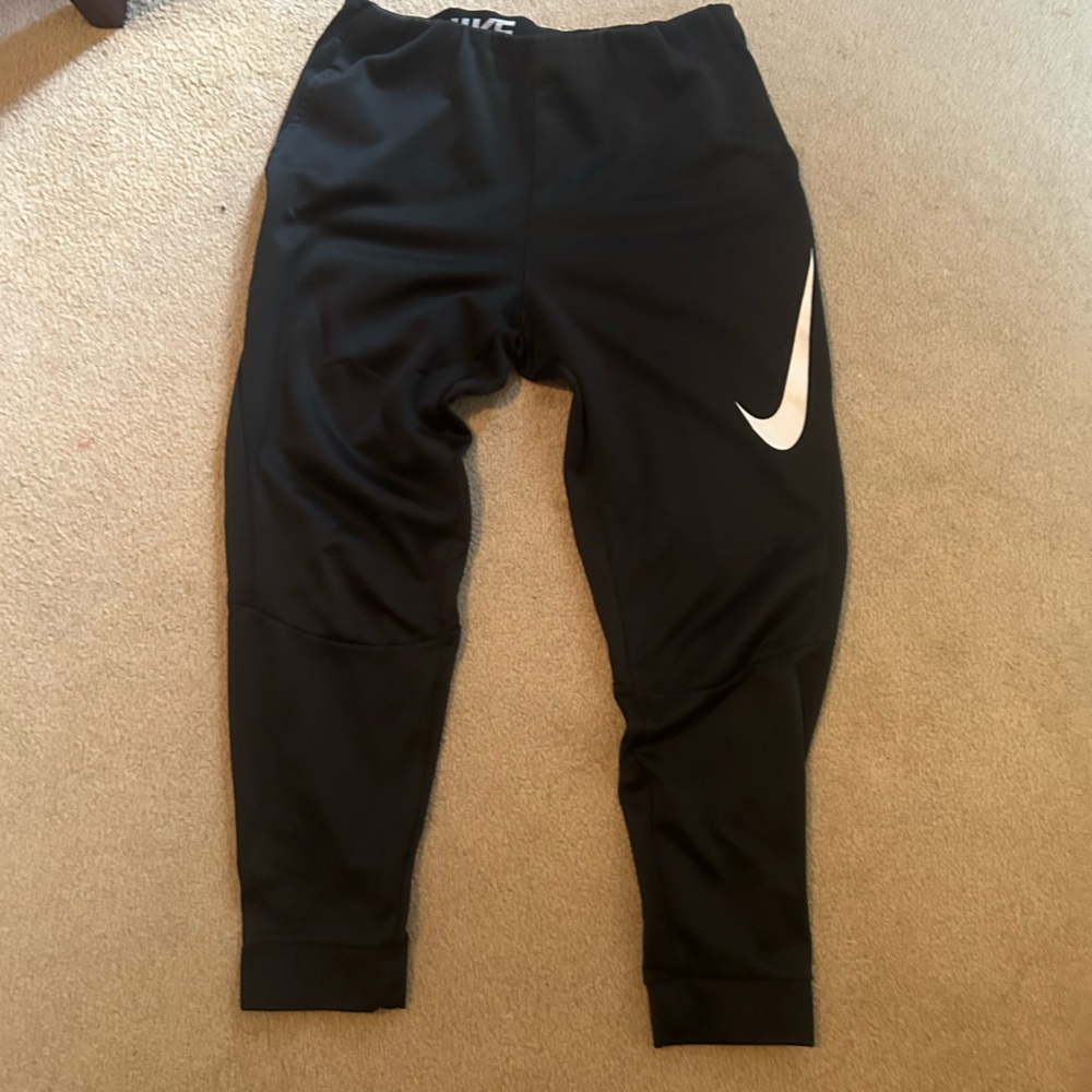 Black nike sweatpants with swoosh